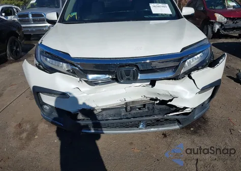 2019 Honda Pilot Touring z USA, uszkodzony, nr VIN 5FNYF5H66KB017476